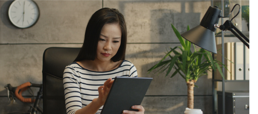 Woman looking at tablet